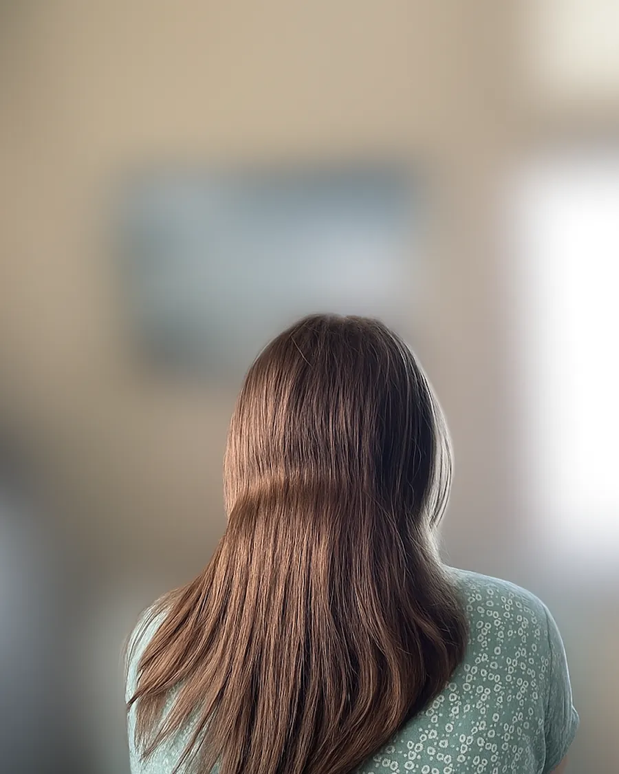 Brushing lisse brun réalisé par Clara Brazy, coiffeuse à Dunkerque